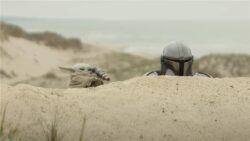 (L-R) Grogu and Mandalorian (Pedro Pascal) in Lucasfilm’s THE MANDALORIAN & GROGU. Photo courtesy of Lucasfilm. © 2025 Lucasfilm Ltd™. All Rights Reserved.